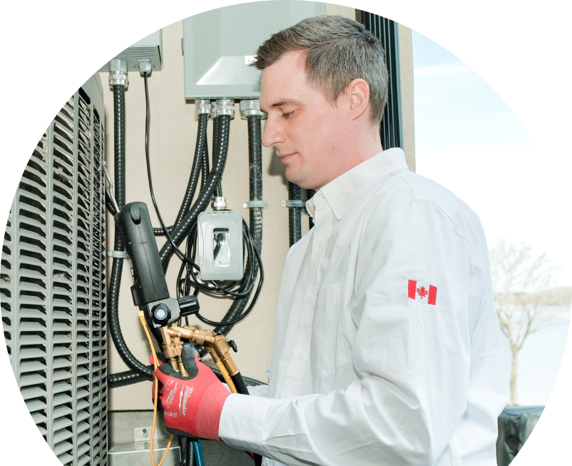 Shines technician servicing an outdoor air conditioner using a digital refrigerant tool, wearing red gloves and a white uniform. Shines technician servicing an outdoor air conditioner using a digital refrigerant tool, wearing red gloves and a white uniform.