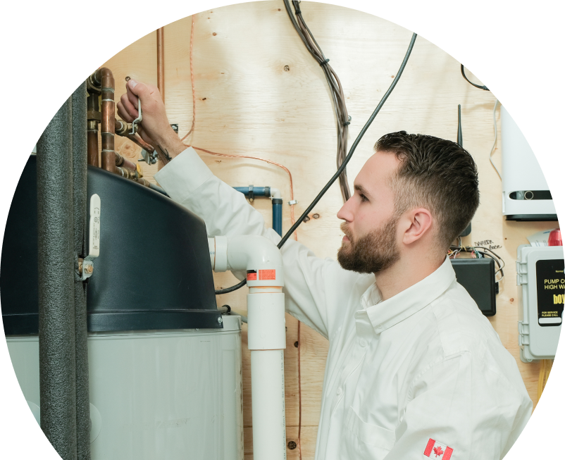 Shines water heater specialist adjusts piping on a large residential unit during a repair service, with exposed wood paneling and mounted utility components in the background. Shines water heater specialist adjusts piping on a large residential unit during a repair service, with exposed wood paneling and mounted utility components in the background.